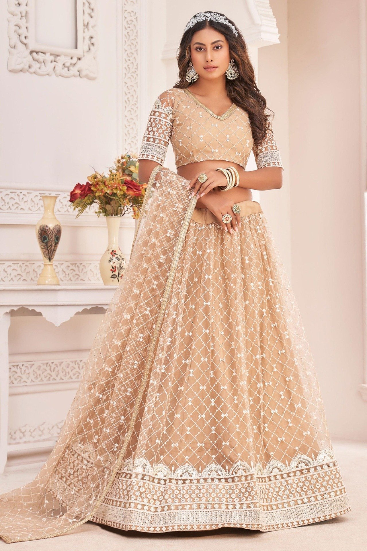 Elegant lehenga choli featuring detailed embroidery and timeless craftsmanship for weddings and festive celebrations. Elegant lehenga choli featuring detailed embroidery and timeless craftsmanship for weddings and festive celebrations.